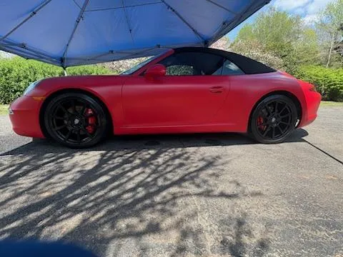 Red convertible exterior after professional detailing in Lewisville, NC